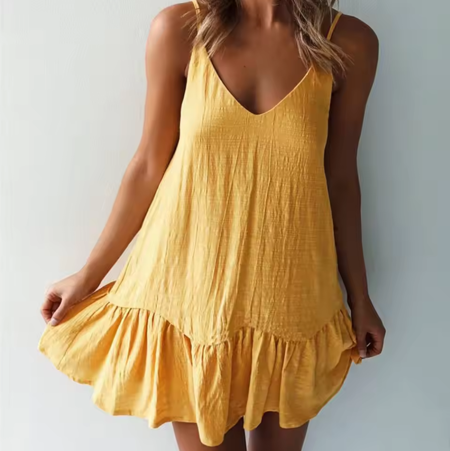 Sleeveless dress with ruffled hemline
