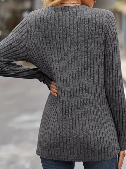 Knitted ribbed sweater with V-neck and buttons